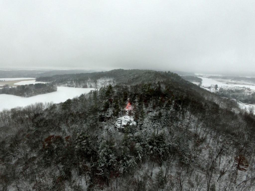 aerial view of christmas tree on bluff